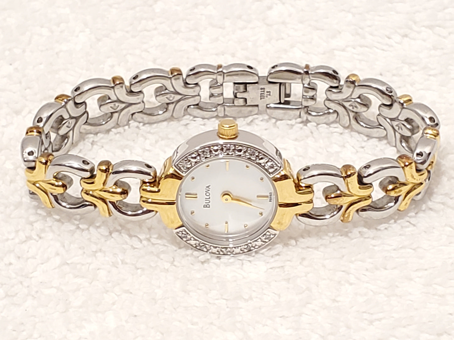 Vintage Bulova Women's Quartz Watch Gold Tone Mother Pearl Dial Diamonds Bezel Stainless Steel