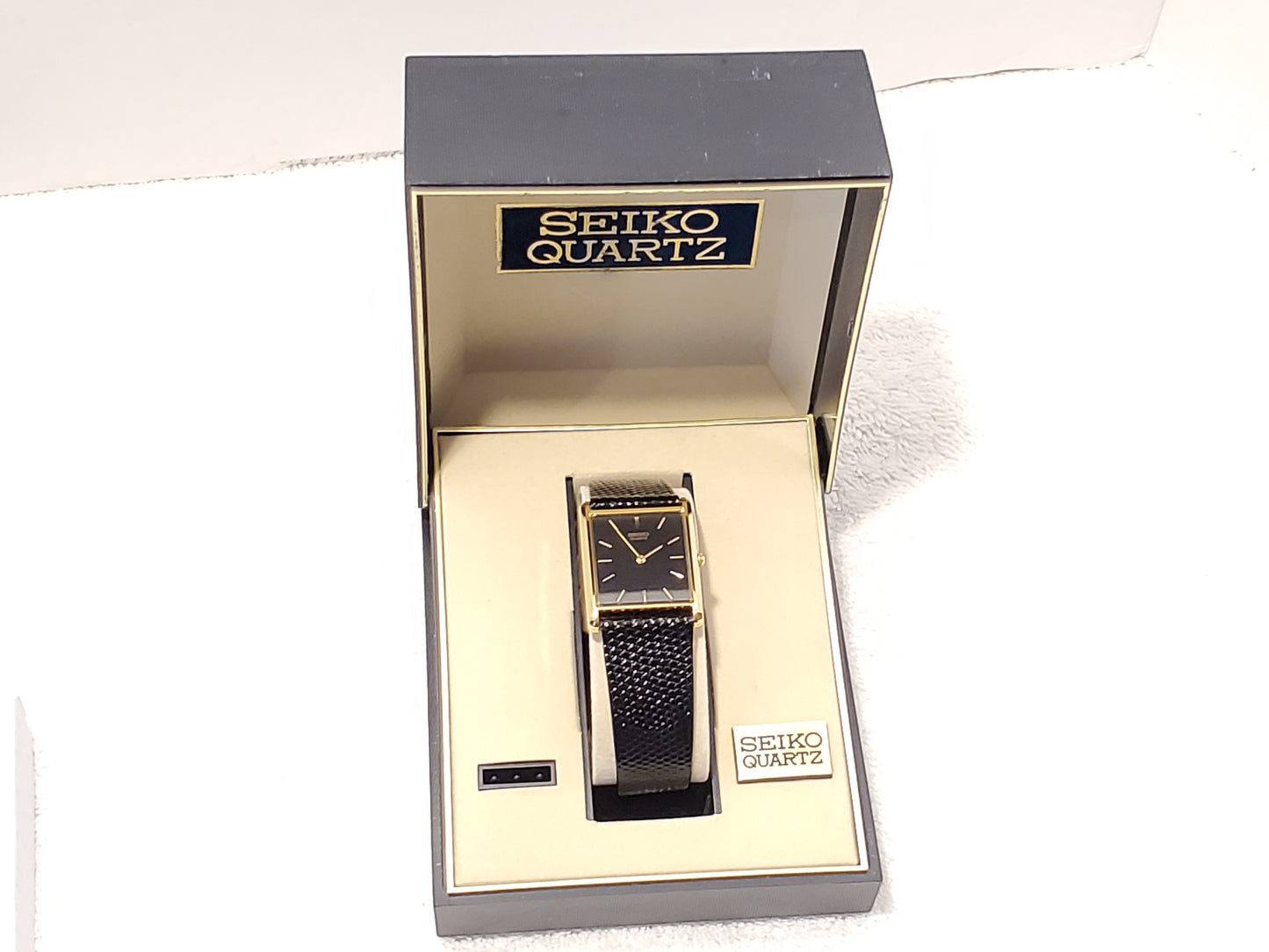 Vintage 1990's Seiko Women's Tank Quartz Watch One Jewel Black Dial Calfskin Strap Gold Tone