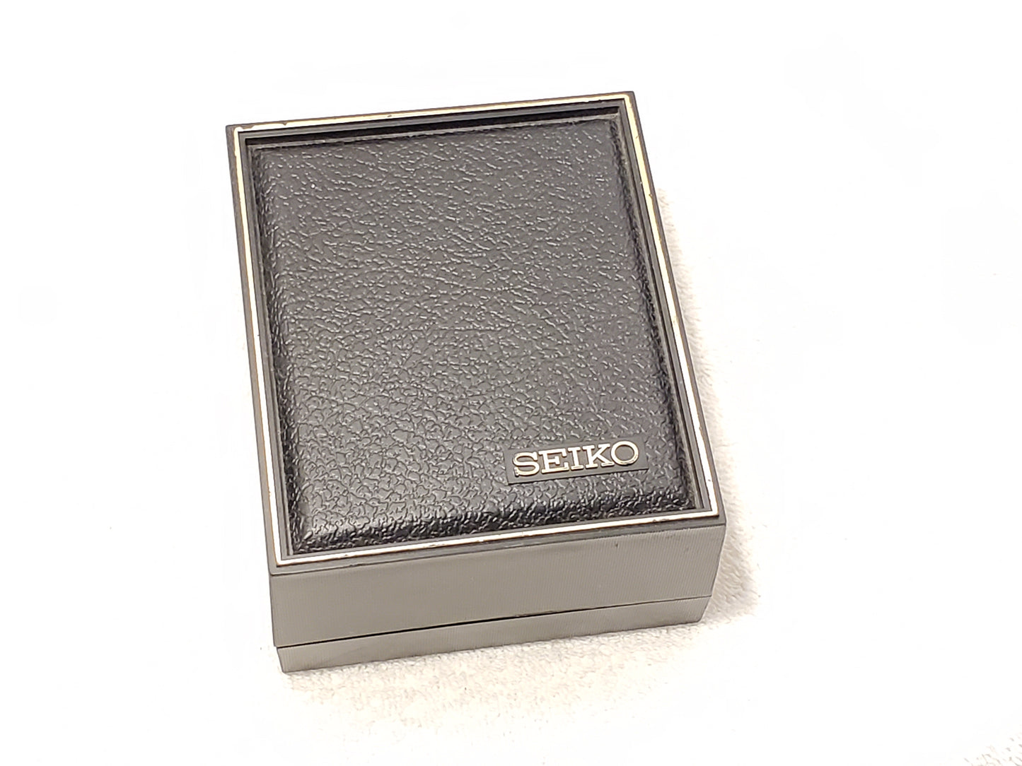 Vintage 1990's Seiko Women's Tank Quartz Watch One Jewel Black Dial Calfskin Strap Gold Tone