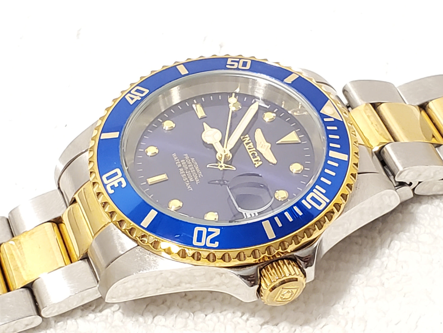 Invicta Automatic Men's Date Watch Twenty Four Jewels Stainless Steel Gold Tone Purple Dial