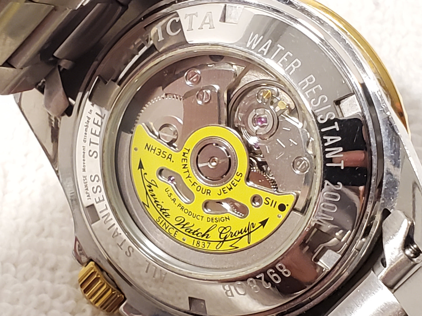 Invicta Automatic Men's Date Watch Twenty Four Jewels Stainless Steel Gold Tone Purple Dial