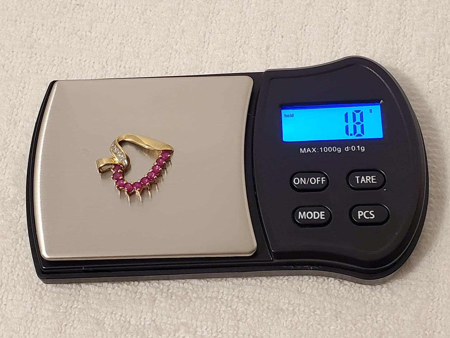 Vintage 10 Karat Yellow Gold Open Heart Pendant Diamonds Red Rubies Women's