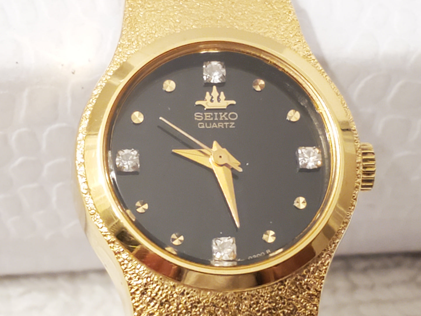 Vintage Seiko Womens Gold Tone Watch Black Dial Four Diamonds S Steel Base Metal