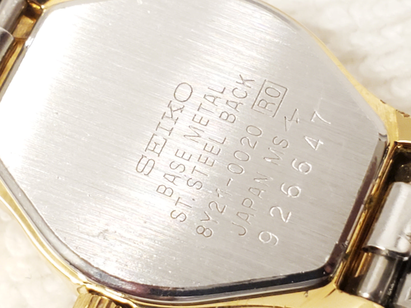 Vintage Seiko Womens Gold Tone Watch Black Dial Four Diamonds S Steel Base Metal
