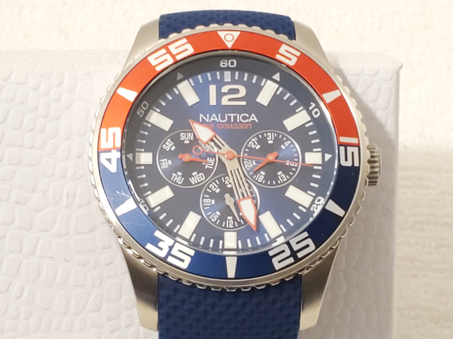 Nautica Red Blue Bezel Men's Day Date Quartz Watch Stainless Steel WR 100 Meters