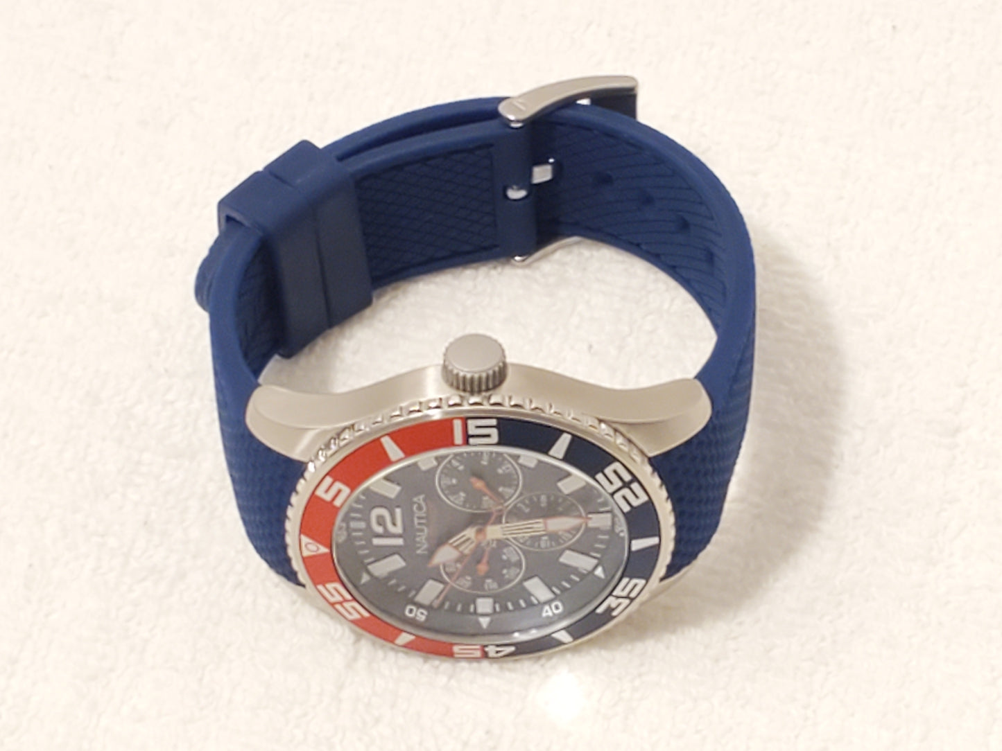 Nautica Red Blue Bezel Men's Day Date Quartz Watch Stainless Steel WR 100 Meters