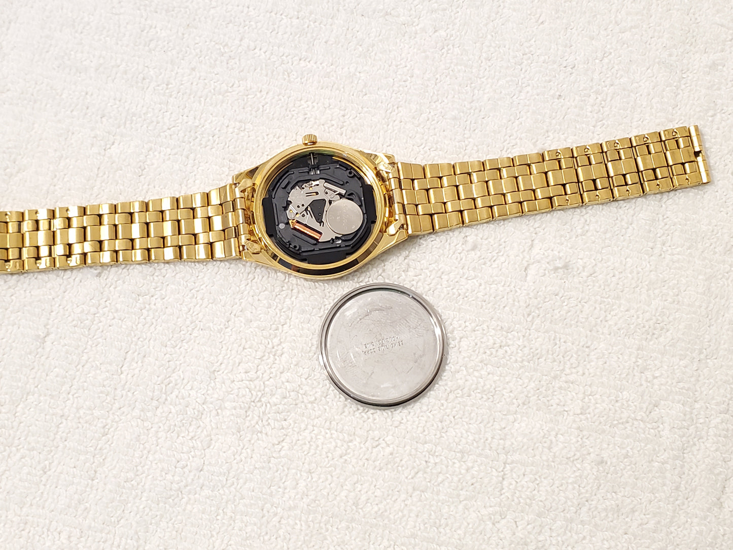 Vintage Seiko Mens Black Dial Gold Tone Day Date Watch One Jewel Stainless Steel