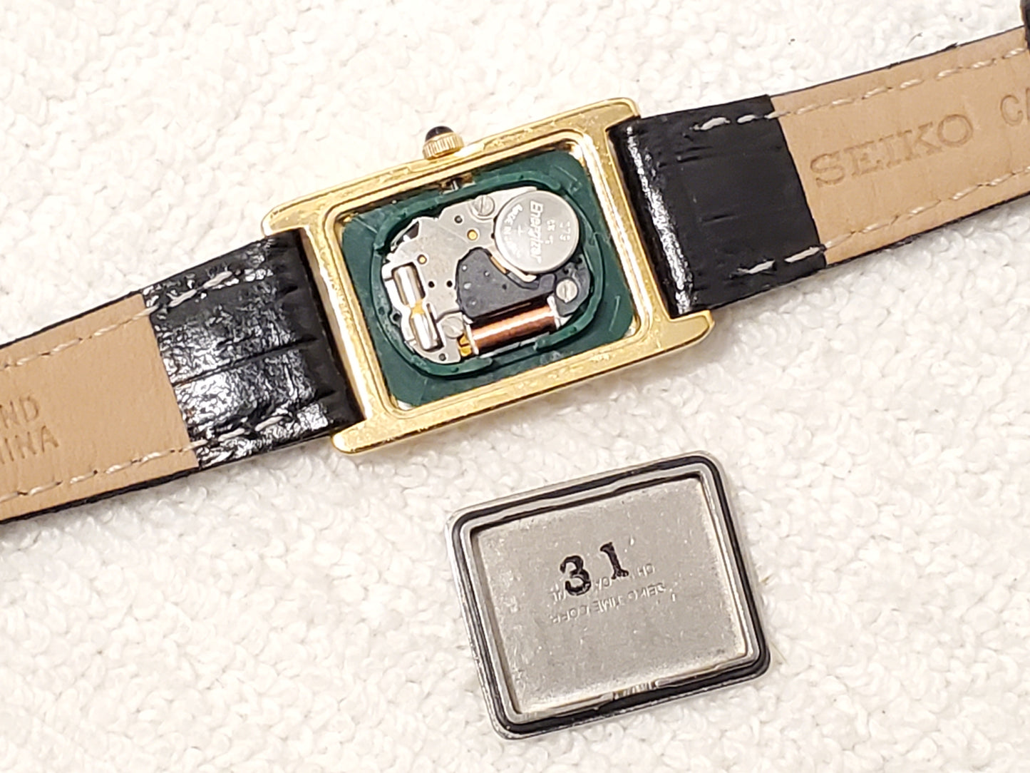 Vintage Seiko Womens Tank Gold Tone Watch White Dial Roman Numerals Leather Band