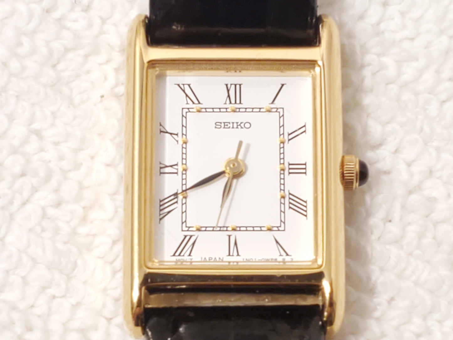Vintage Seiko Womens Tank Gold Tone Watch White Dial Roman Numerals Leather Band