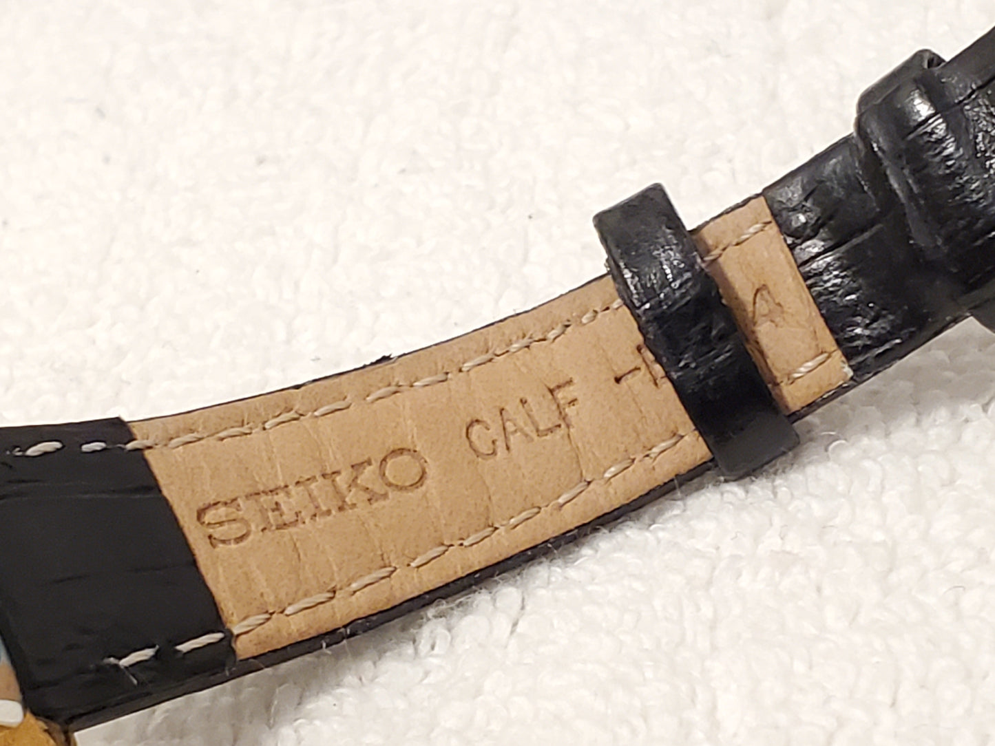 Vintage Seiko Womens Tank Gold Tone Watch White Dial Roman Numerals Leather Band
