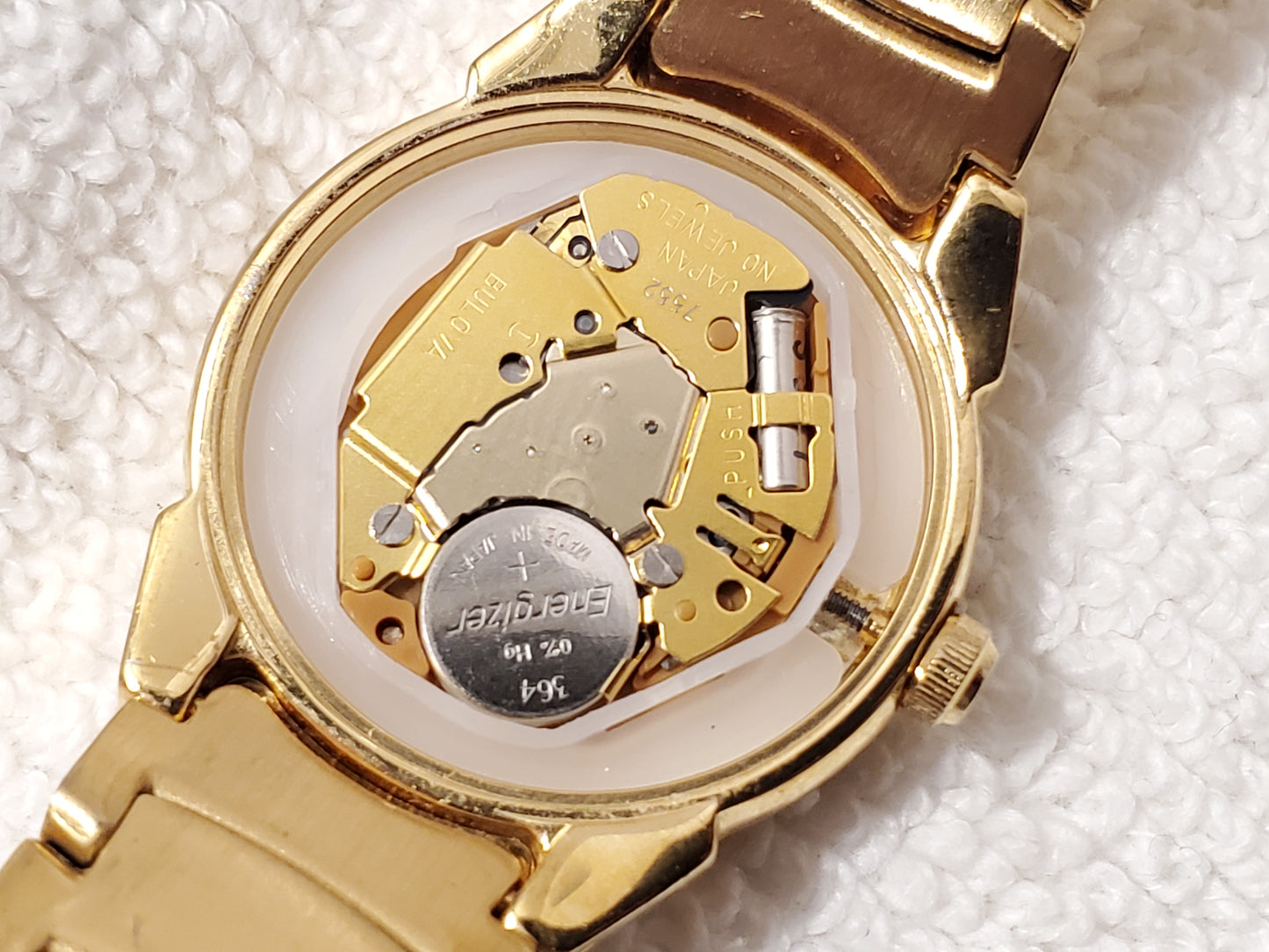 Vintage Bulova Gold Tone Stainless Steel Women's Date Quartz Watch Silver Dial