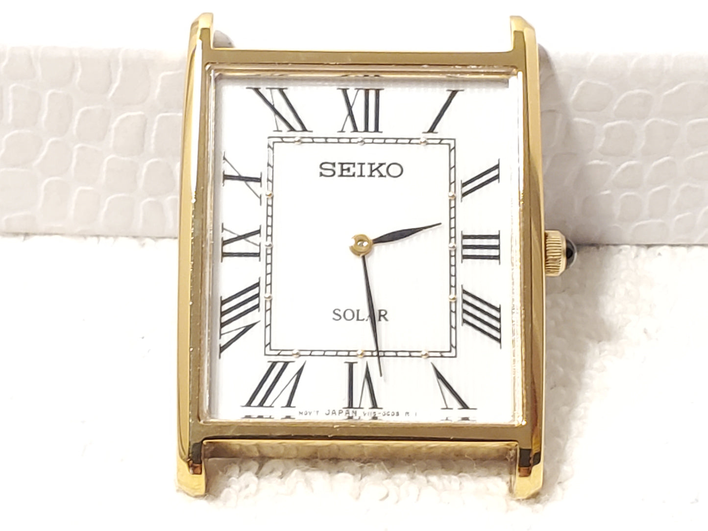 Seiko Solar Men's Tank Gold Tone Watch White Dial Black Roman Numerals S Steel