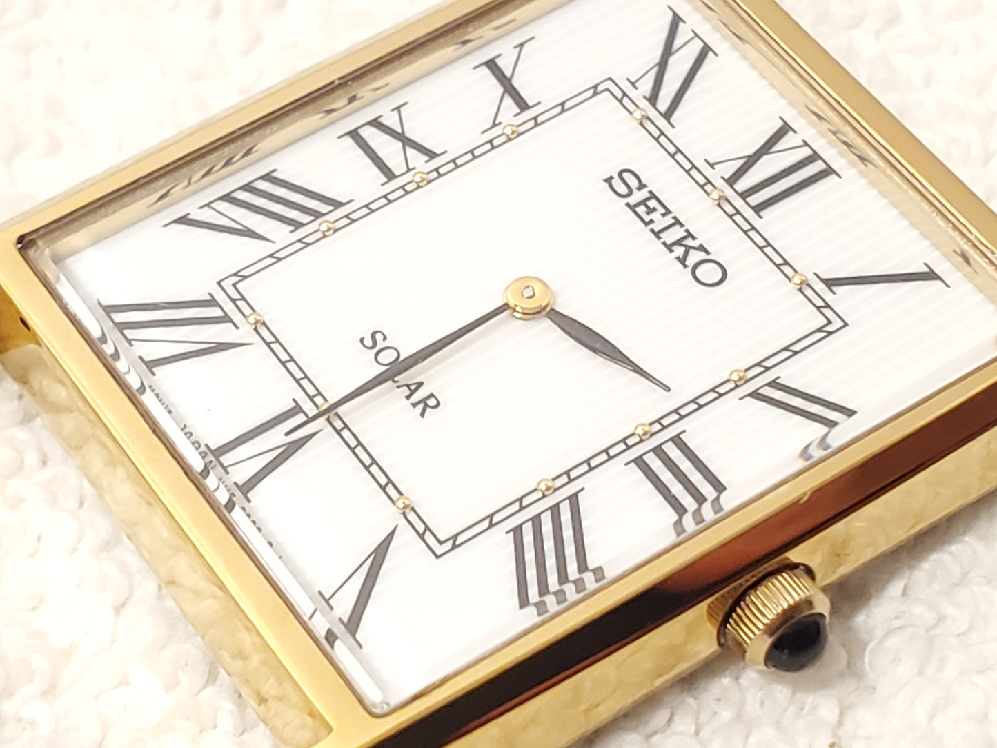 Seiko Solar Men's Tank Gold Tone Watch White Dial Black Roman Numerals S Steel