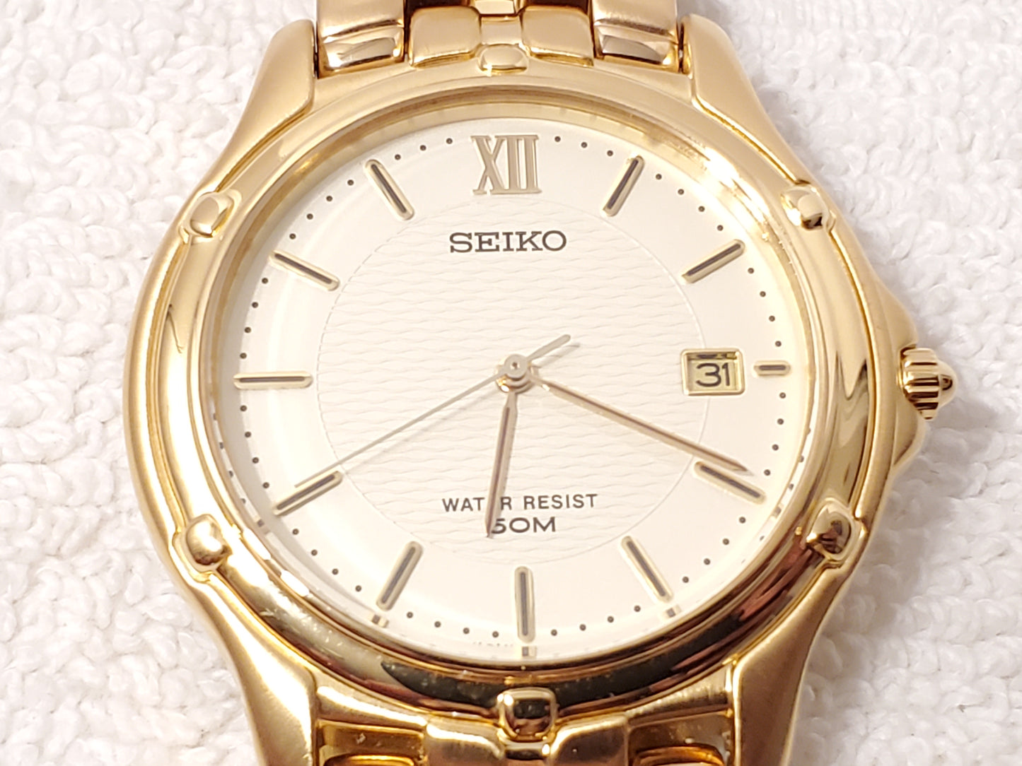 Vintage Seiko Gold Tone Date Men's Quartz Watch One Jewel Stainless Steel WR 50M