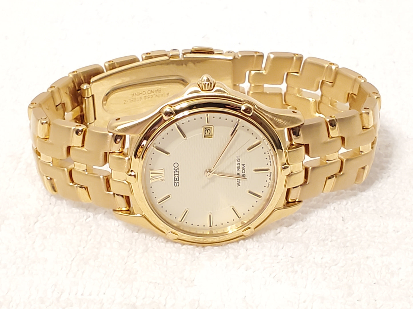 Vintage Seiko Gold Tone Date Men's Quartz Watch One Jewel Stainless Steel WR 50M