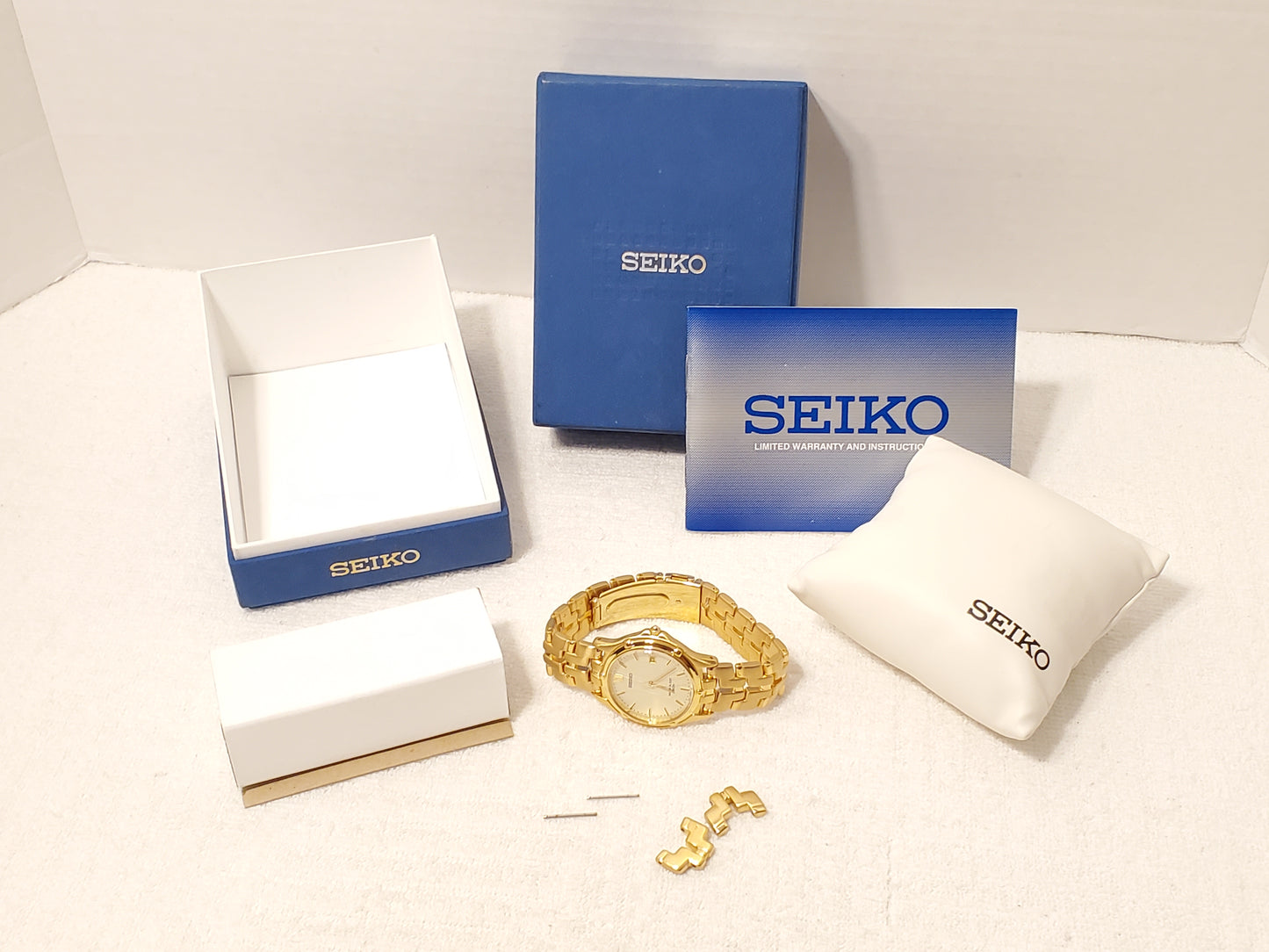 Vintage Seiko Gold Tone Date Men's Quartz Watch One Jewel Stainless Steel WR 50M