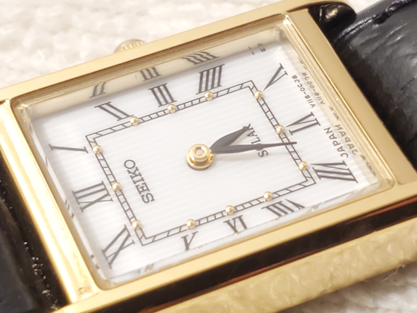 Vintage Seiko Solar Women's Tank Watch White Dial Roman Numerals Gold Tone SS