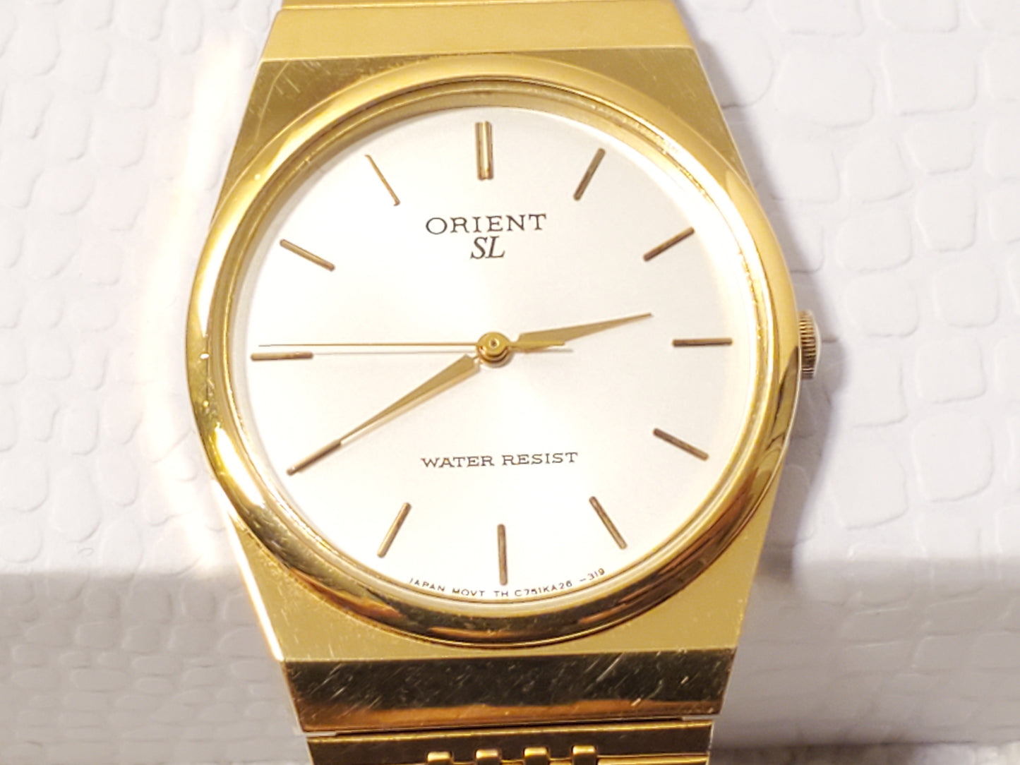 Vintage Orient Mens Gold Tone Quartz Watch Silver Dial Stainless Steel One Jewel