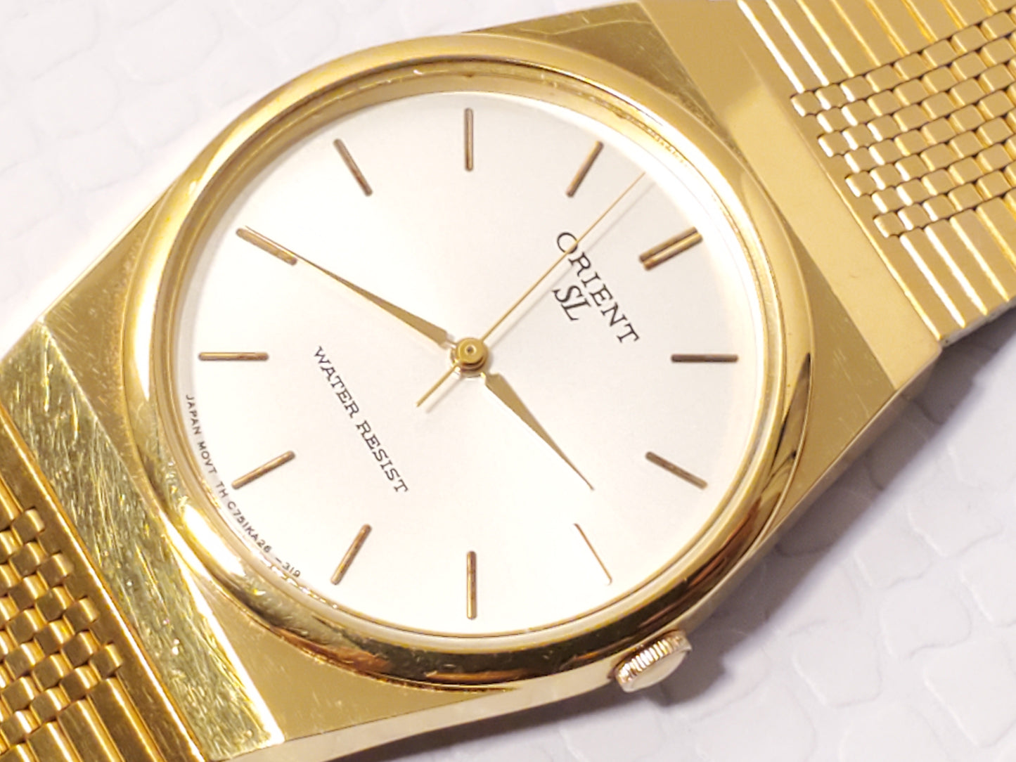Vintage Orient Mens Gold Tone Quartz Watch Silver Dial Stainless Steel One Jewel