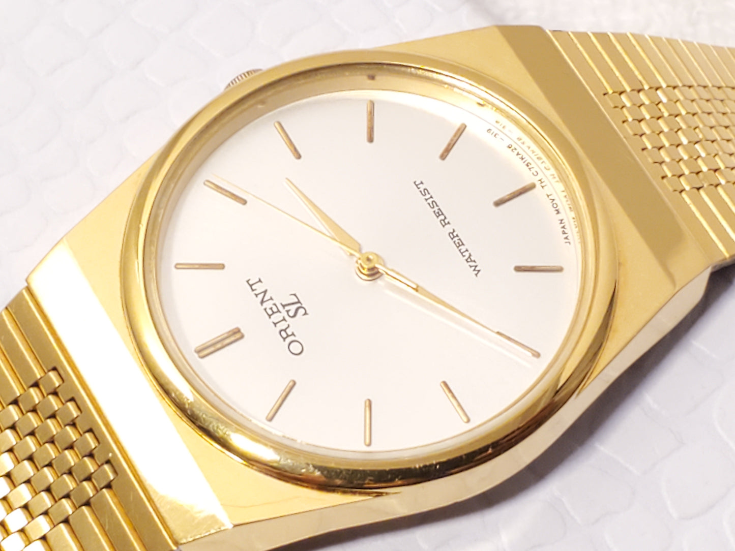 Vintage Orient Mens Gold Tone Quartz Watch Silver Dial Stainless Steel One Jewel