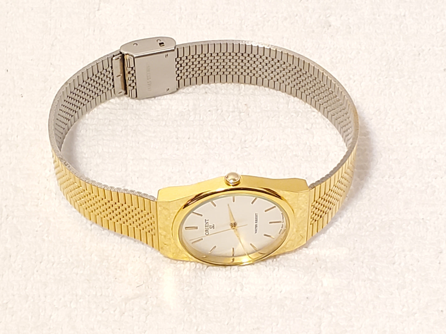 Vintage Orient Mens Gold Tone Quartz Watch Silver Dial Stainless Steel One Jewel