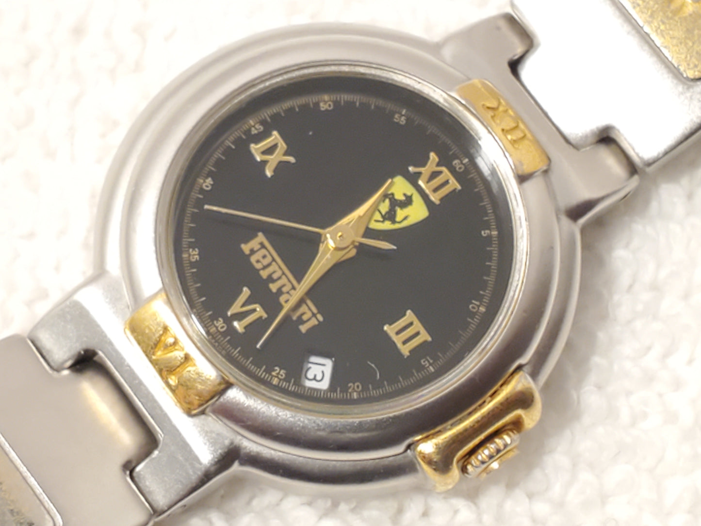 Vintage Ferrari Swiss Women's Date Gold Tone One Jewel Watch Black Dial S Steel