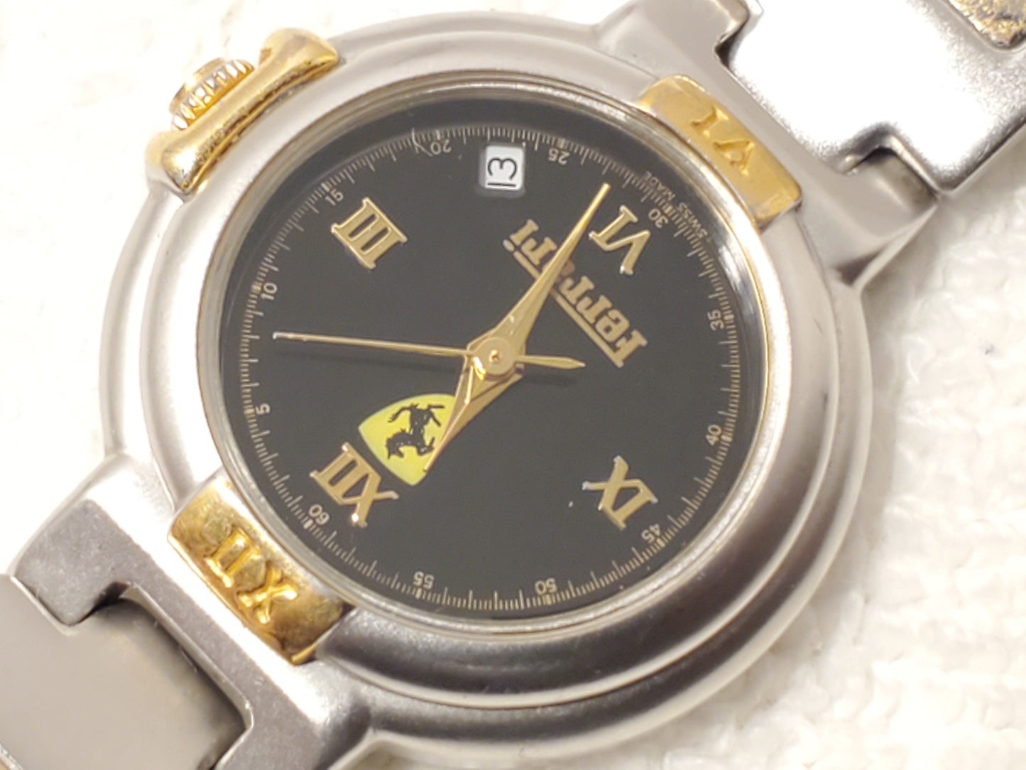 Vintage Ferrari Swiss Women's Date Gold Tone One Jewel Watch Black Dial S Steel