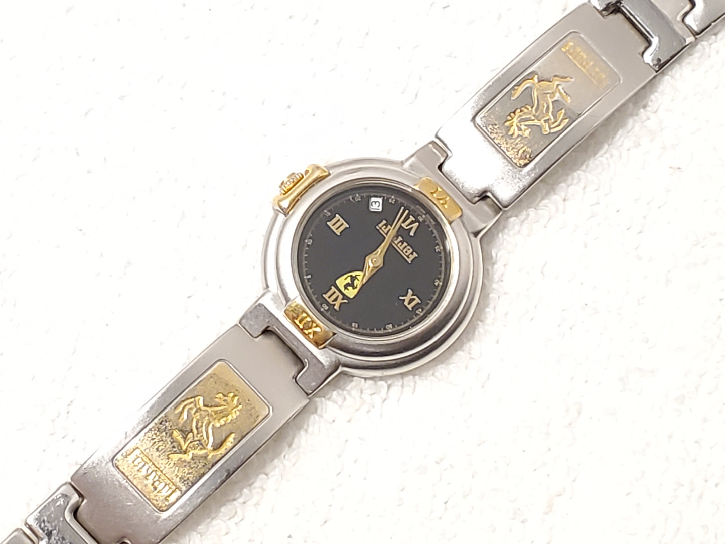 Vintage Ferrari Swiss Women's Date Gold Tone One Jewel Watch Black Dial S Steel