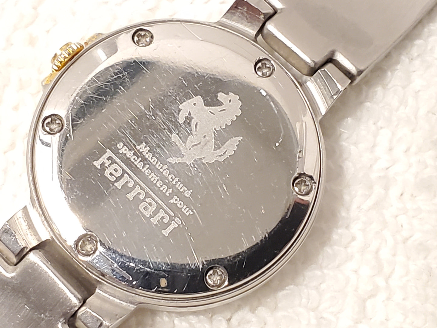 Vintage Ferrari Swiss Women's Date Gold Tone One Jewel Watch Black Dial S Steel