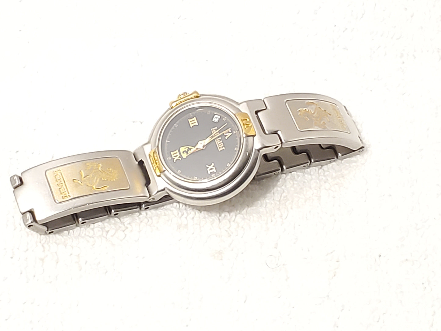 Vintage Ferrari Swiss Women's Date Gold Tone One Jewel Watch Black Dial S Steel