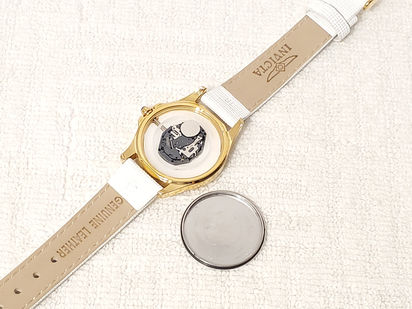 Invicta Angel Women's Quartz Watch Gold Tone White Leather Strap Blue Stone