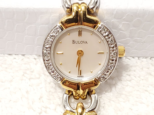 Vintage Bulova Women's Quartz Watch Gold Tone Mother Pearl Dial Diamonds Bezel Stainless Steel