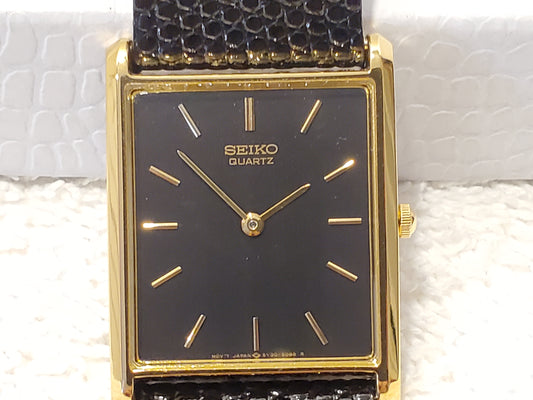 Vintage 1990's Seiko Women's Tank Quartz Watch One Jewel Black Dial Calfskin Strap Gold Tone