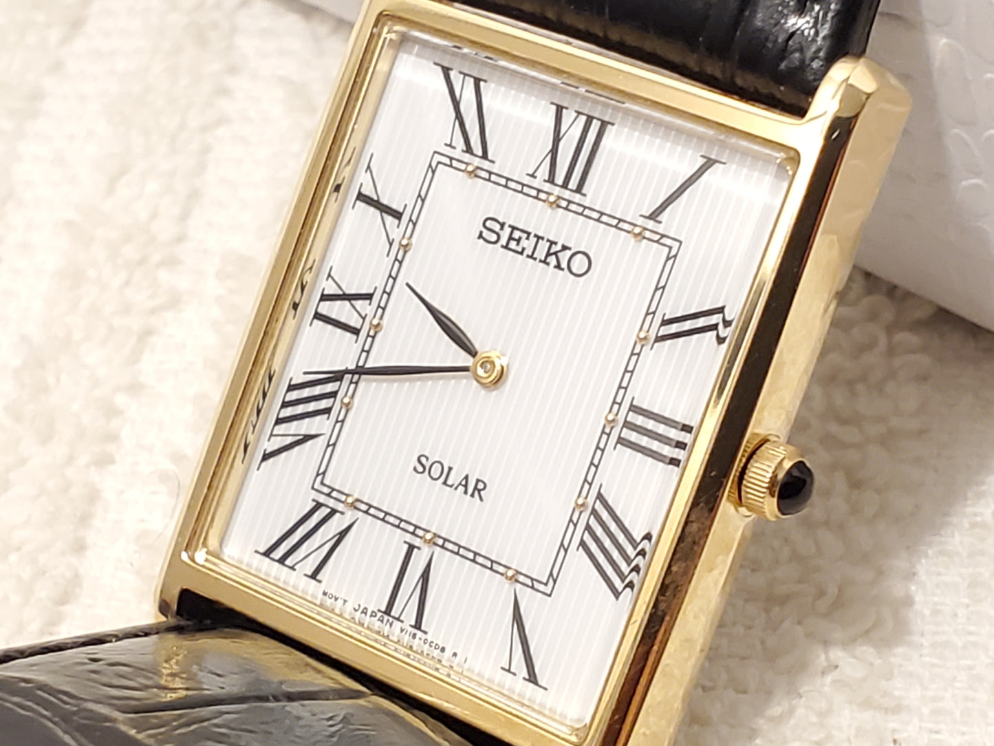 Vintage Seiko Solar Tank Men's Watch Roman Numerals White Dial Black Strap