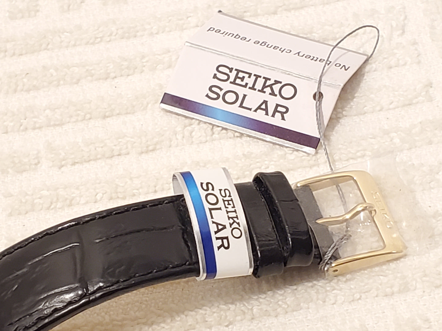 Vintage Seiko Solar Tank Men's Watch Roman Numerals White Dial Black Strap