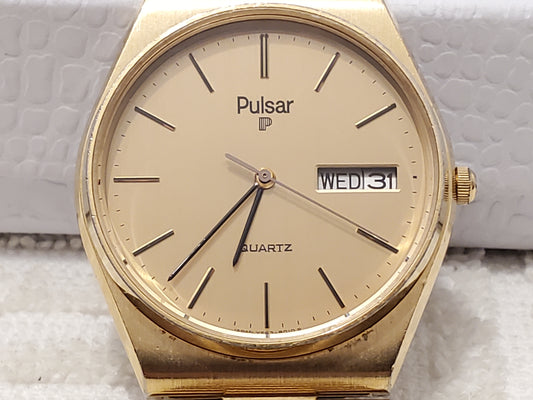 Vintage Pulsar Men's Gold Tone Day Date Quartz Watch Stainless Steel