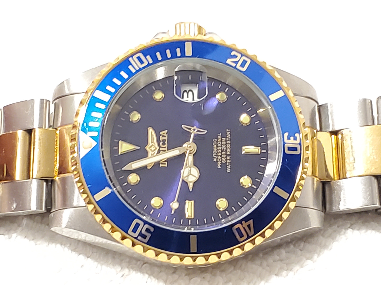 Invicta Automatic Men's Date Watch Twenty Four Jewels Stainless Steel Gold Tone Purple Dial