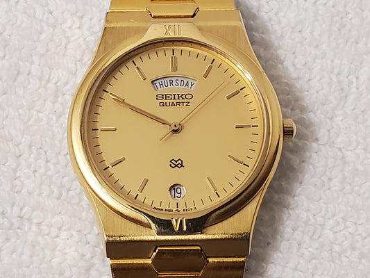 Vintage Seiko SQ Mens Day Date Watch Stainless Steel Gold Plated Three Jewels