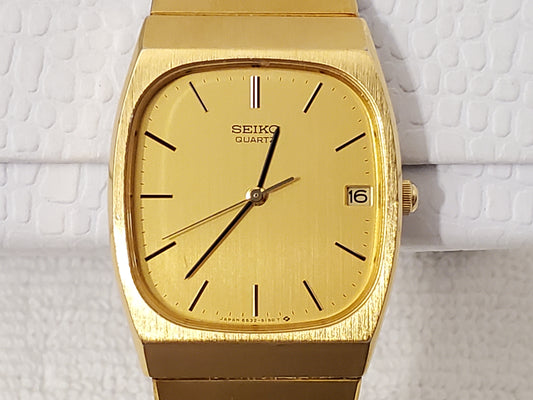 Vintage Seiko Men's Gold Tone Date Stainless Steel Quartz Watch Five Jewels