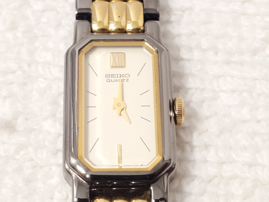 Vintage Seiko Women's Gold Tone Black Quartz Watch 1 Jewel Roman Numeral S Steel