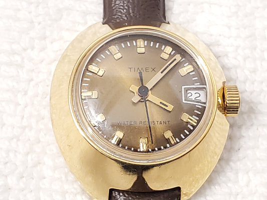 Vintage Timex Gold Plated Wind Up Analog Women's Watch Brown Dial Plastic Strap