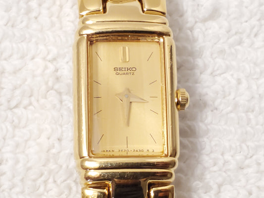 Vintage Seiko Women's Gold Tone Quartz Tank Watch One Jewel Base Metal S Steel