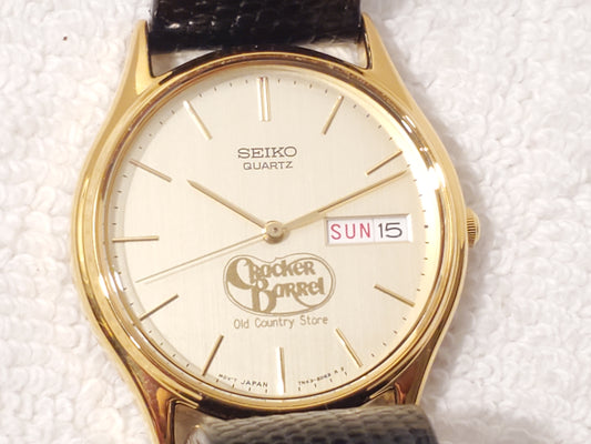 Vintage Seiko Men's Gold Tone Day Date Quartz Watch Black Strap Stainless Steel