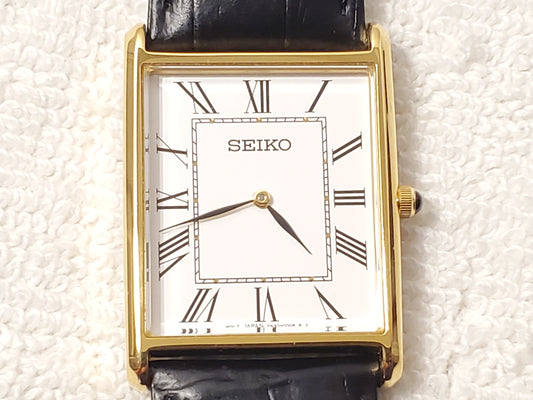 Vintage Seiko Men's Tank Watch White Dial Black Leather Gold Tone Roman Numerals