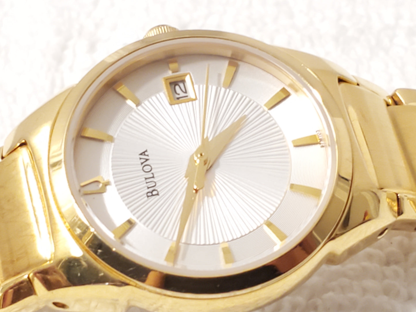 Vintage Bulova Gold Tone Stainless Steel Women's Date Quartz Watch Silver Dial