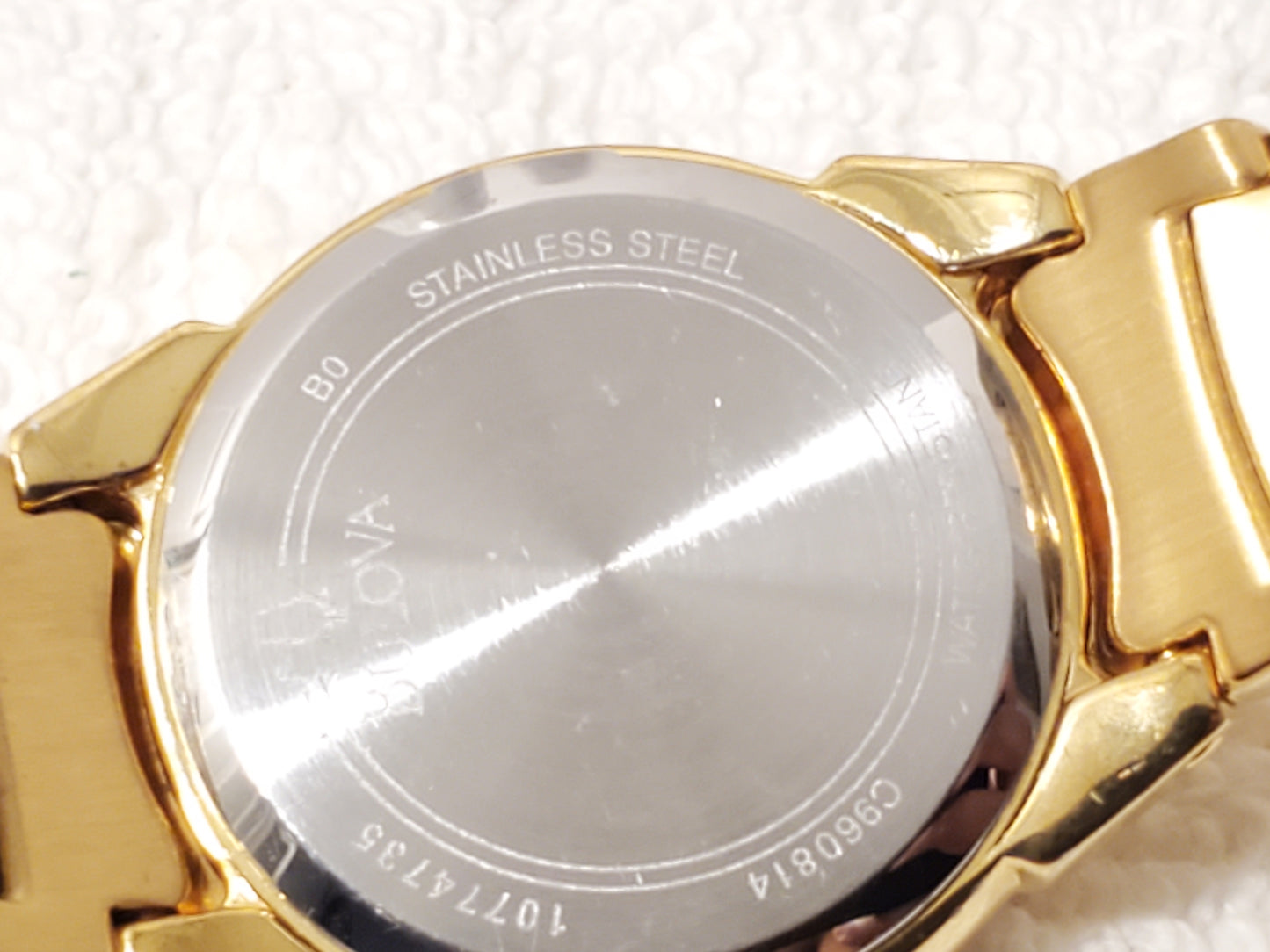 Vintage Bulova Gold Tone Stainless Steel Women's Date Quartz Watch Silver Dial