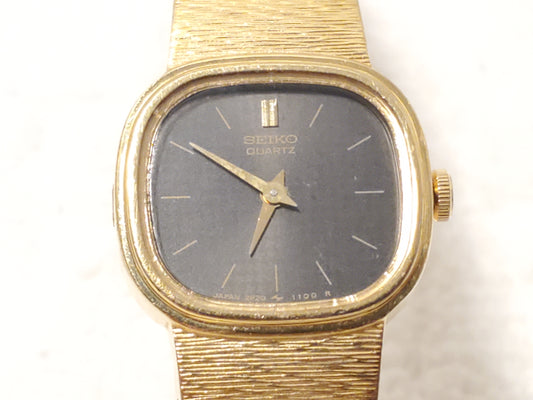 Vintage Seiko Women’s Gold Tone Quartz Watch Two Jewels Black Dial Base Metal