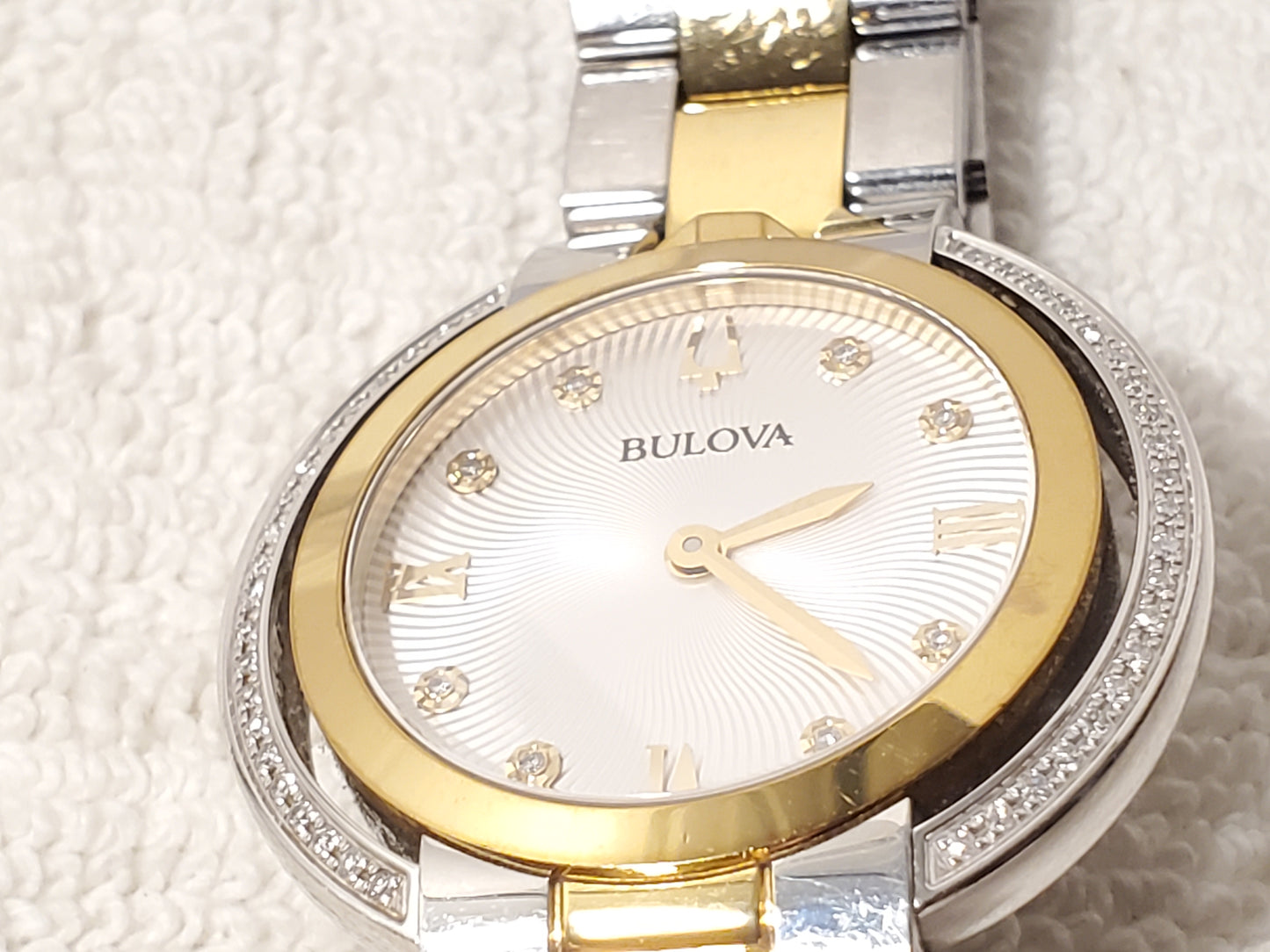 Bulova Women's Diamonds Bezel Silver Dial Gold Tone Sapphire Crystal Watch SS