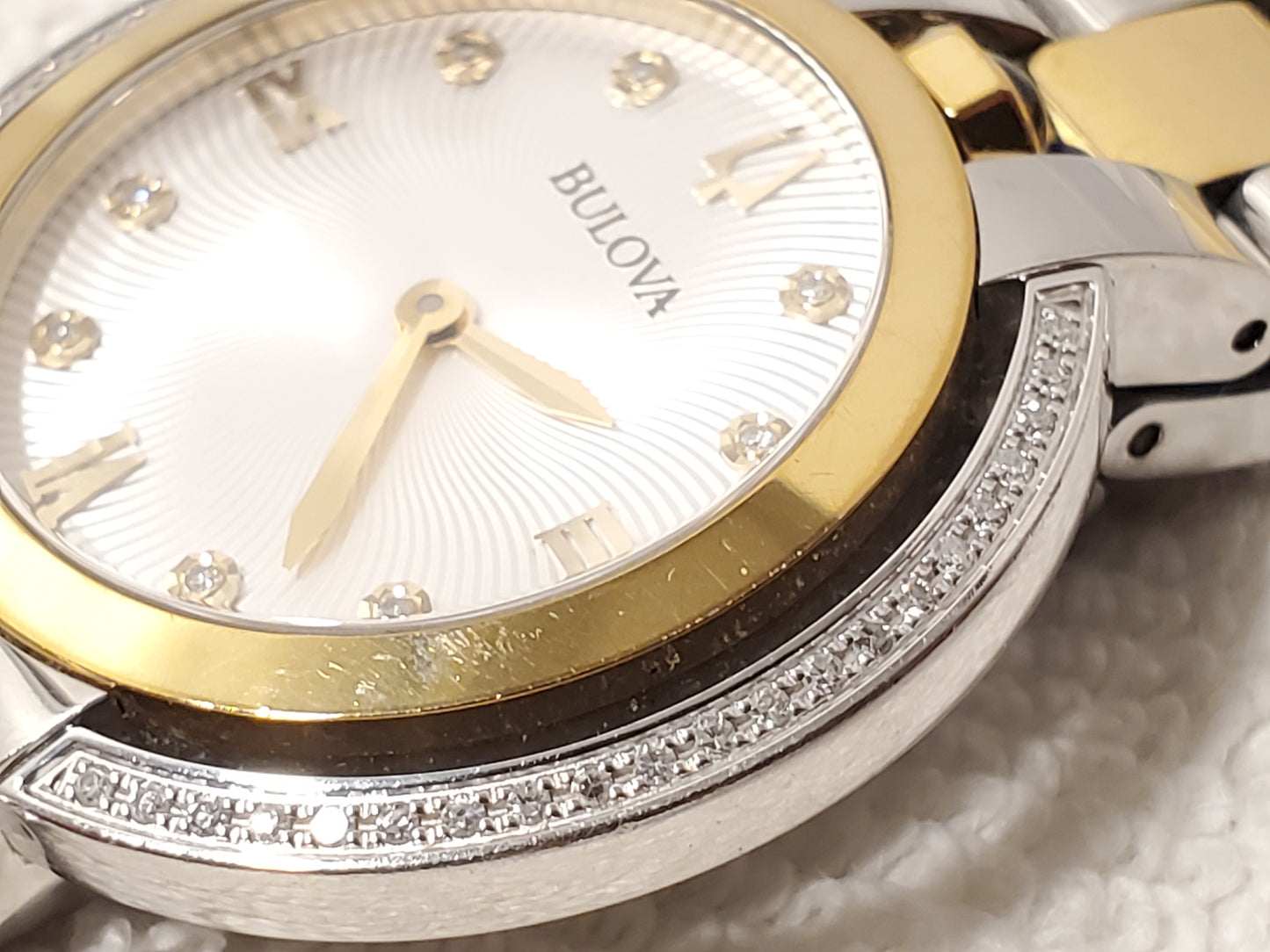 Bulova Women's Diamonds Bezel Silver Dial Gold Tone Sapphire Crystal Watch SS