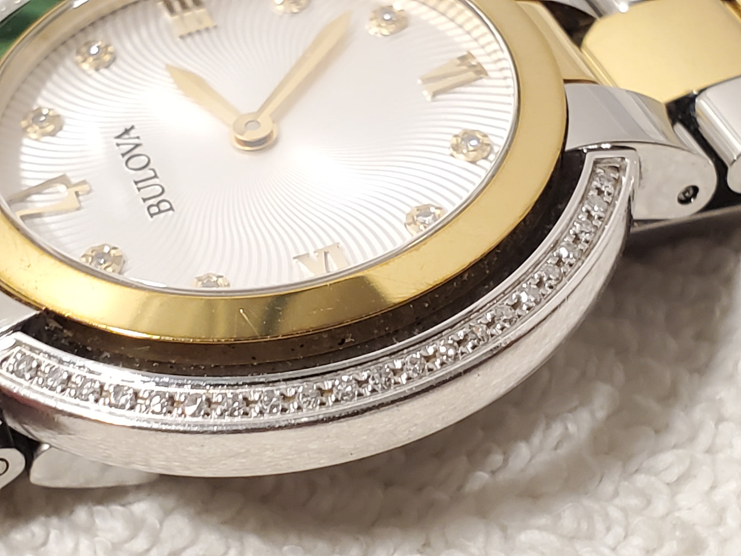 Bulova Women's Diamonds Bezel Silver Dial Gold Tone Sapphire Crystal Watch SS